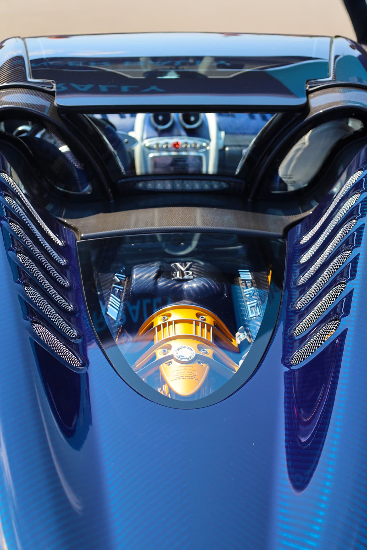 Pagani Huayra Roadster rear engine bay with exposed V12 and gold accents